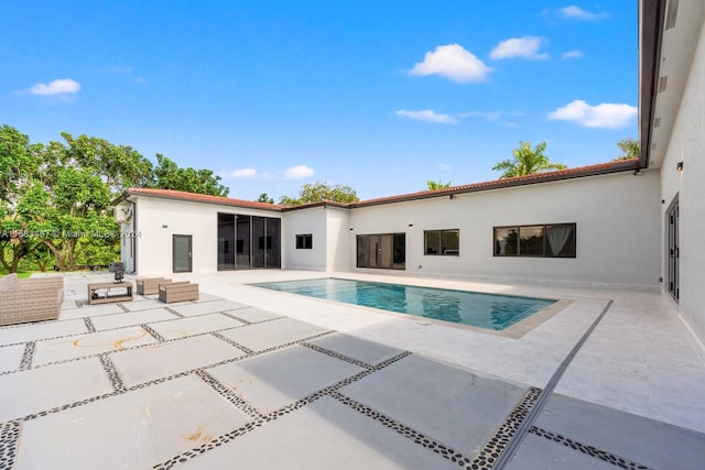 view of pool with a patio