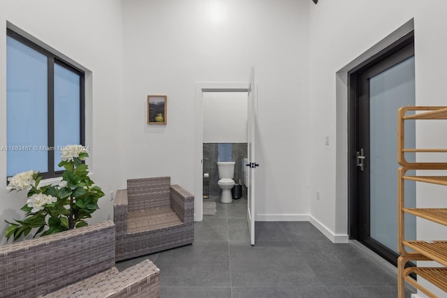 interior space featuring dark tile patterned floors