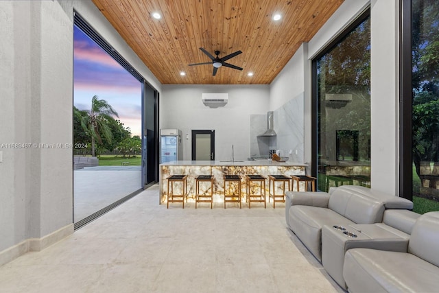 sunroom / solarium with a wall unit AC, ceiling fan, wooden ceiling, and indoor bar