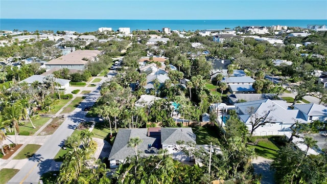 aerial view with a residential view and a water view