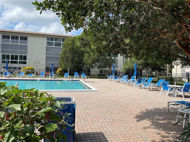 view of swimming pool featuring a patio