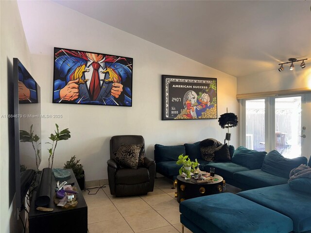9230 SW 100th Ave Rd, Miami, FL 33176 - living room with tile patterned flooring and vaulted ceiling