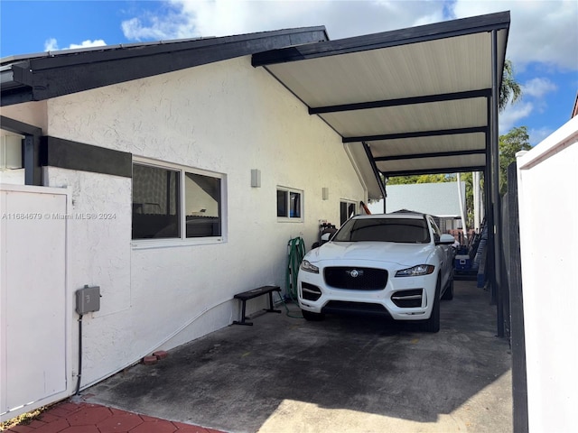 view of car parking featuring a carport