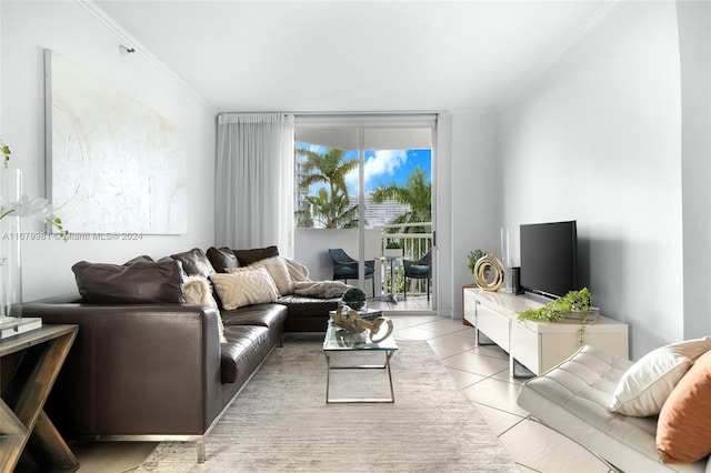 living room featuring ornamental molding and light tile patterned floors