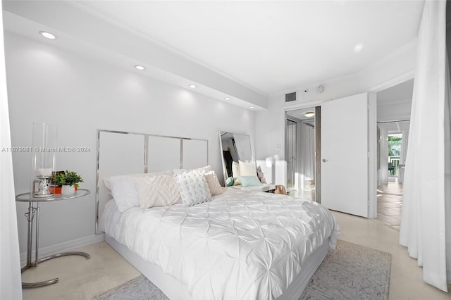 carpeted bedroom with ornamental molding