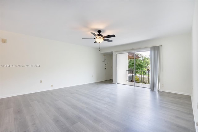 unfurnished room with ceiling fan and light hardwood / wood-style floors