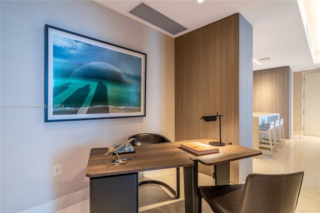 home office featuring light tile patterned flooring