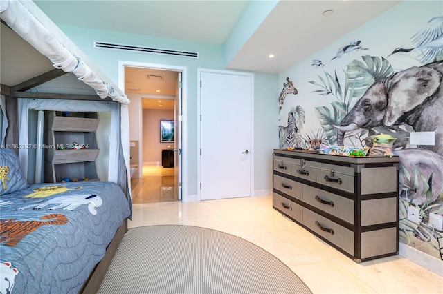 bedroom featuring light tile patterned flooring