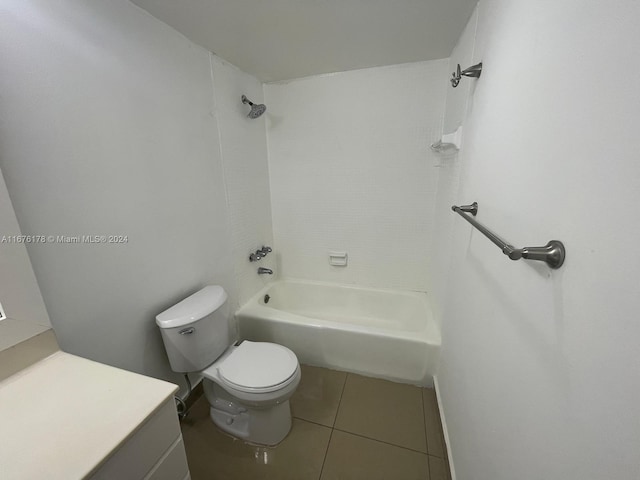 full bathroom featuring vanity, toilet, tile patterned floors, and tub / shower combination