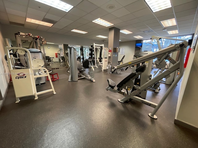 gym featuring a drop ceiling