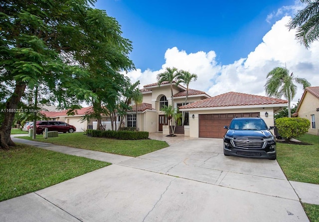 mediterranean / spanish home with a front lawn