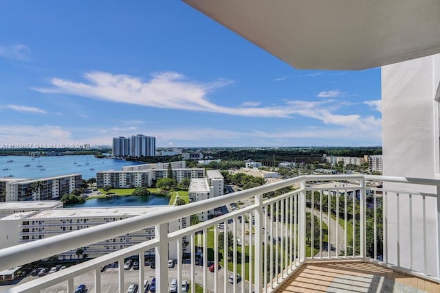 balcony featuring a water view