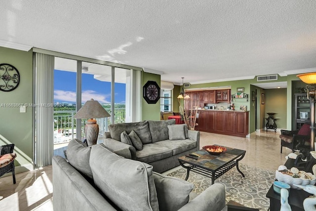 18011 Biscayne Blvd Unit 1705, Aventura, FL 33160 - living room with a textured ceiling and crown molding