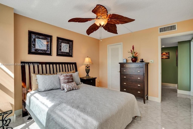 18011 Biscayne Blvd Unit 1705, Aventura, FL 33160 - bedroom with light marble finish flooring, a closet, and a ceiling fan