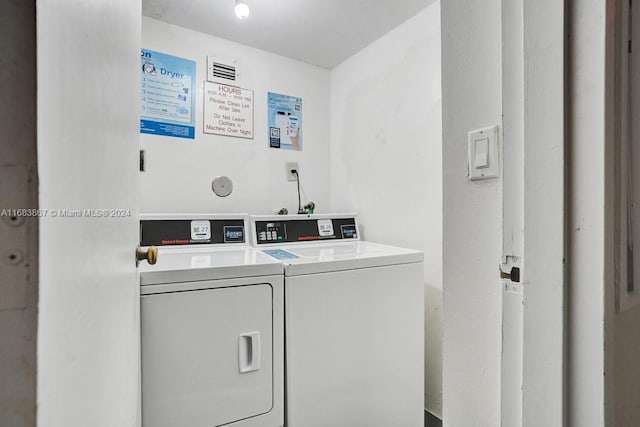 18011 Biscayne Blvd Unit 1705, Aventura, FL 33160 - shared laundry room featuring washing machine and clothes dryer