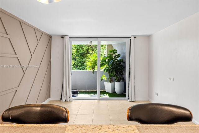 interior space with light tile patterned floors