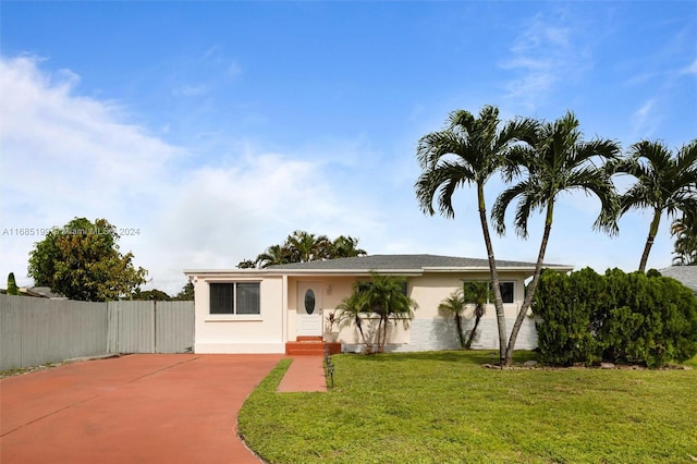 view of front of home with a front lawn