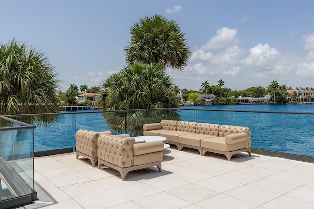 view of swimming pool featuring a water view