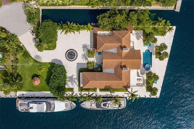 bird's eye view with a water view