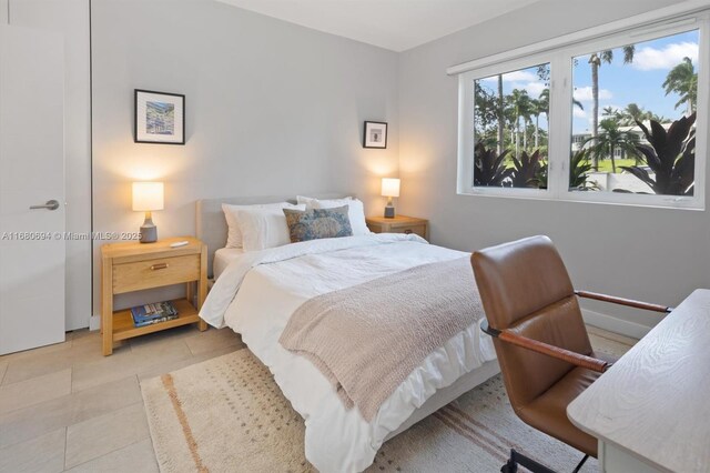 1610 S Bayshore Dr, Miami, FL 33133 - bedroom with tile patterned flooring
