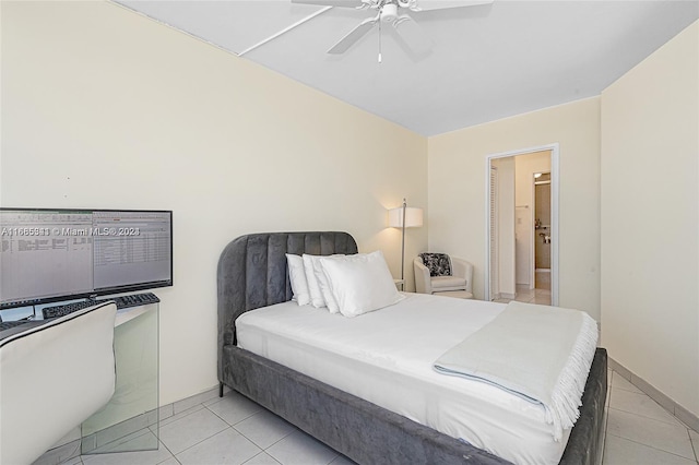 tiled bedroom featuring ceiling fan