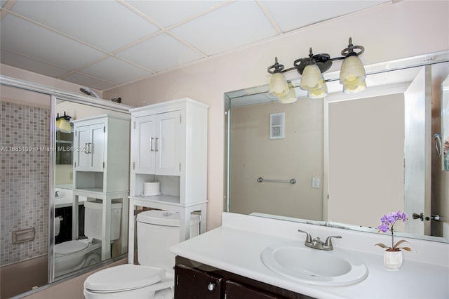 full bathroom with toilet, enclosed tub / shower combo, and vanity