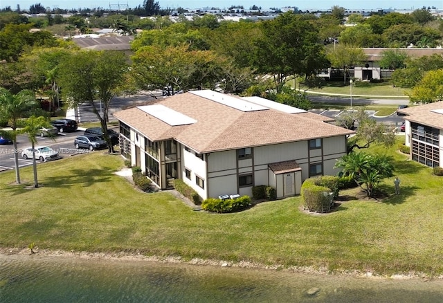 drone / aerial view with a water view