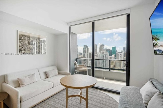 living room with floor to ceiling windows