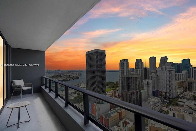 view of balcony at dusk