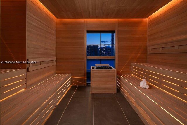 601 Ne 1st 4114, Miami, FL 33132 - relaxing sauna / steam room with wood walls, tile patterned floors, and wood ceiling