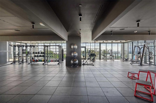 workout area featuring expansive windows