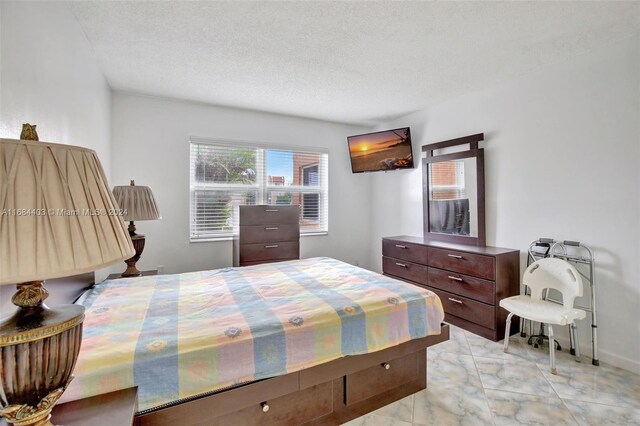 bedroom with a textured ceiling