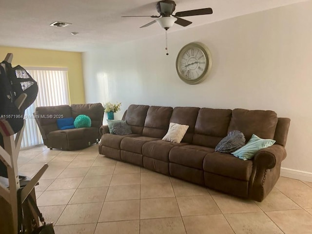 4046 Eastridge Dr, Deerfield Beach, FL 33064 - living area featuring light tile patterned floors, visible vents, and ceiling fan
