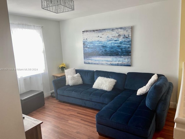 living room with dark hardwood / wood-style flooring