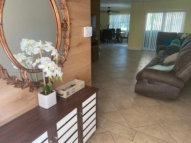 4046 Eastridge Dr, Deerfield Beach, FL 33064 - living area featuring light tile patterned flooring and a ceiling fan