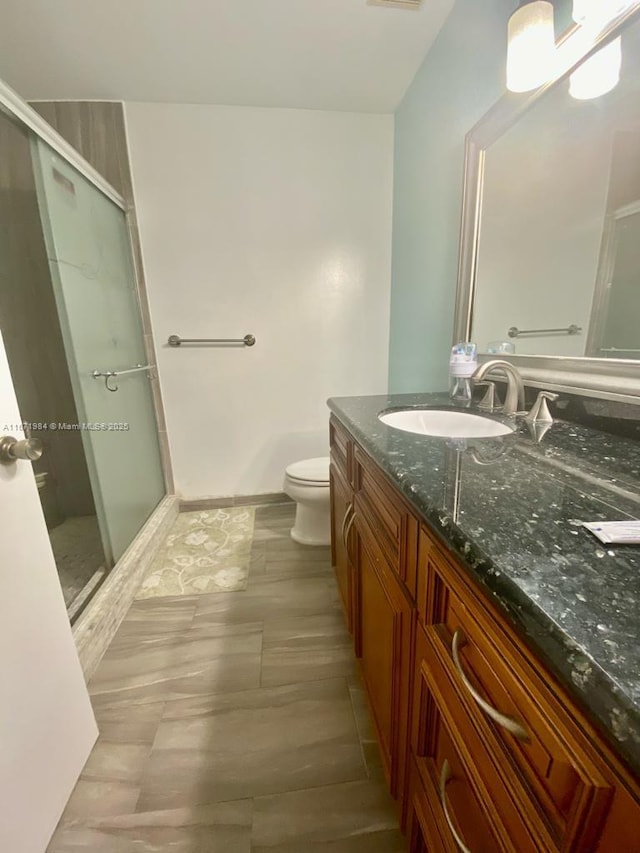 4046 Eastridge Dr, Deerfield Beach, FL 33064 - full bath featuring visible vents, vanity, a shower stall, and toilet