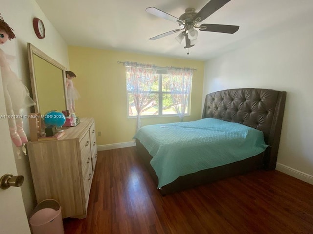 4046 Eastridge Dr, Deerfield Beach, FL 33064 - bedroom with dark wood-style floors, ceiling fan, and baseboards
