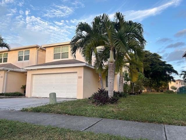 4046 Eastridge Dr, Deerfield Beach, FL 33064 - view of front of property with a garage, stucco siding, concrete driveway, and a front yard