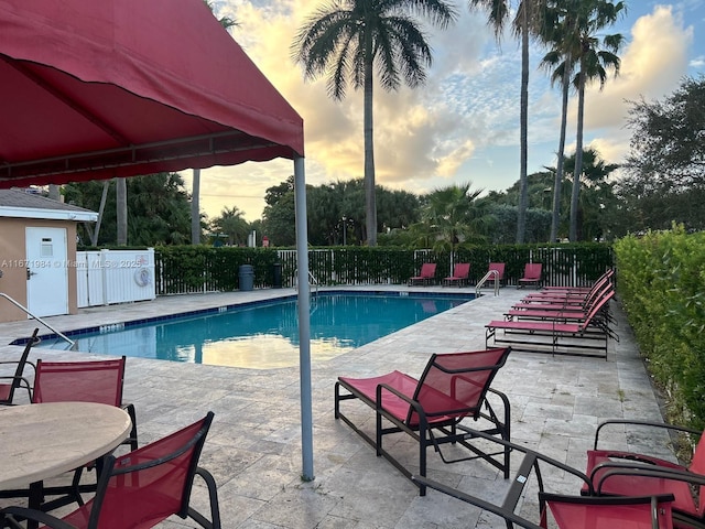 4046 Eastridge Dr, Deerfield Beach, FL 33064 - community pool with a patio area and fence