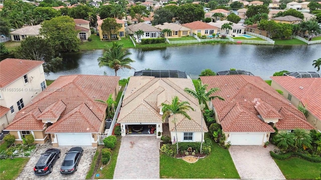 drone / aerial view with a water view