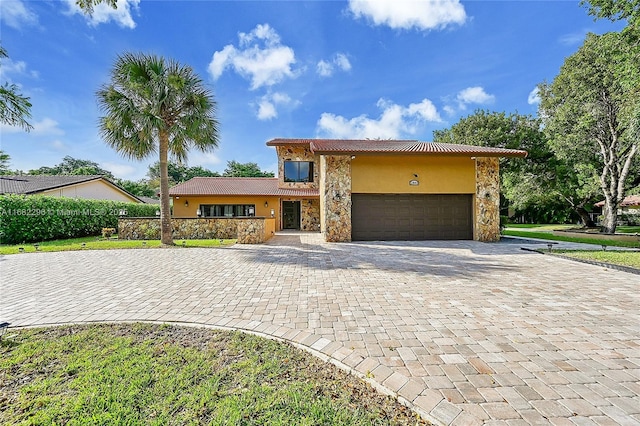 view of front of property featuring a garage