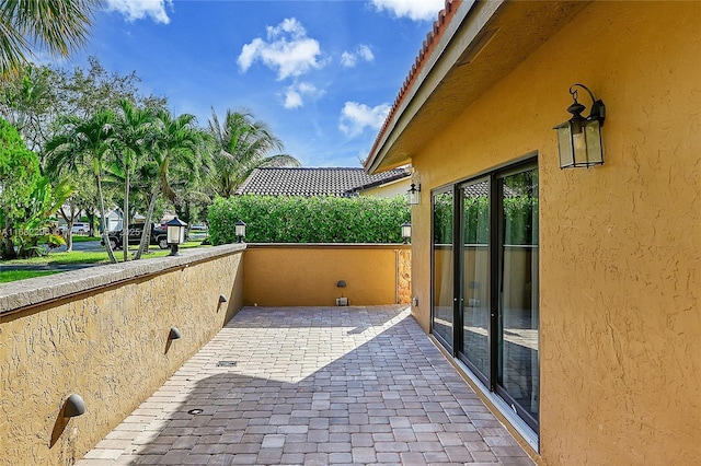 view of patio / terrace with a balcony