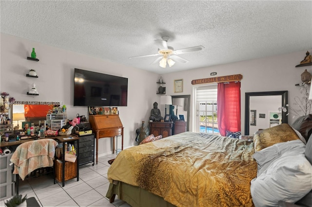 bedroom with light tile patterned flooring, a textured ceiling, and ceiling fan