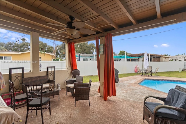 view of patio / terrace featuring ceiling fan