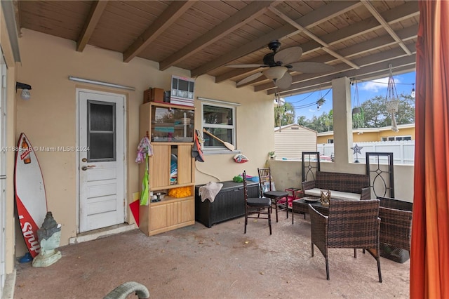 view of patio with an outdoor hangout area and ceiling fan