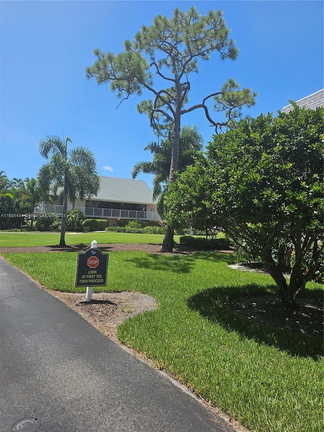 view of community featuring a lawn