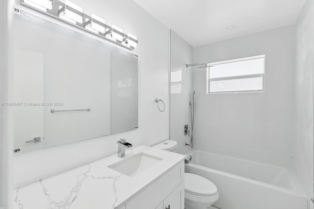 full bathroom with vanity, shower / washtub combination, and toilet