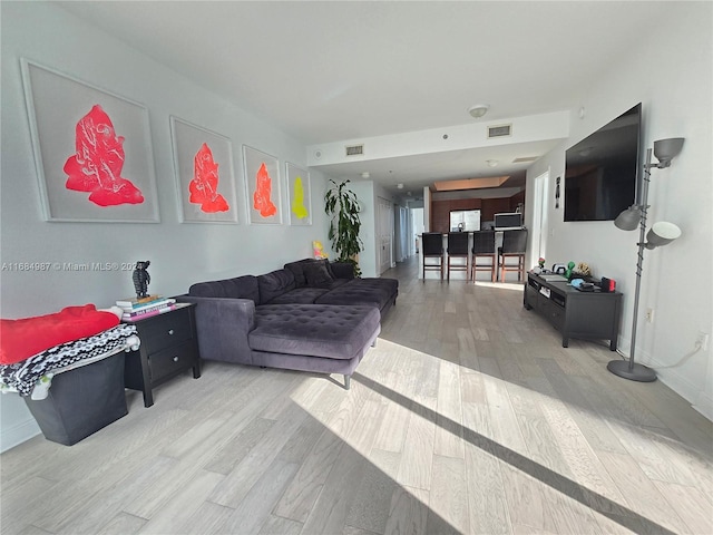 living room with hardwood / wood-style flooring