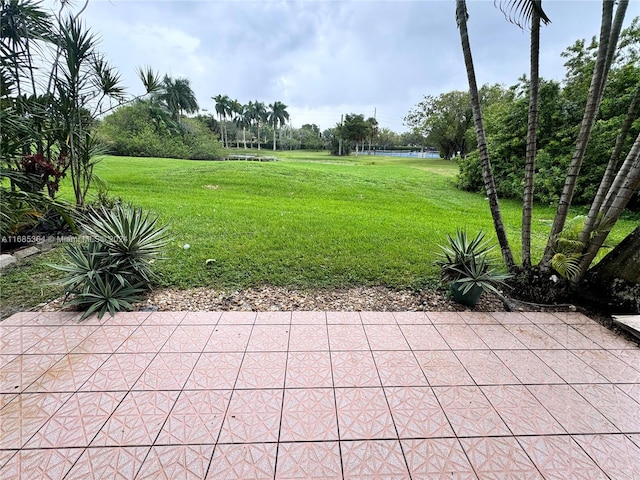 view of patio / terrace featuring a water view