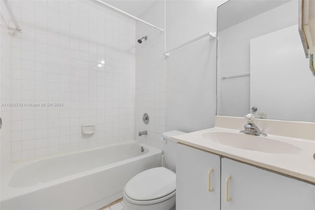 full bathroom featuring vanity, toilet, and tiled shower / bath combo